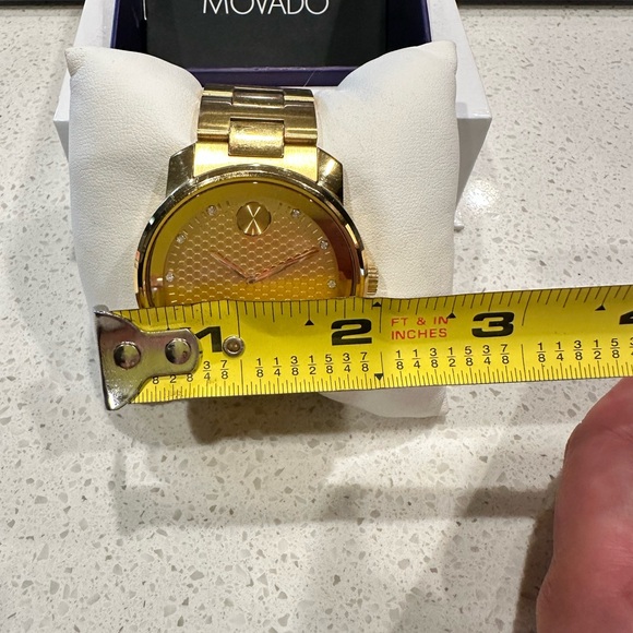 Movado gold and diamond watch. - Picture 10 of 12